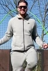 Guy skipping with huge bulge bouncing in trackies