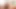 Solo posing ladyboy tugging her cock closeup