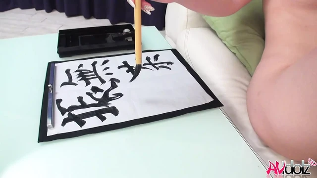 Japanese girl Renka Shimizu handjob and rubs her leg on a guy's dick while writing, uncensored.