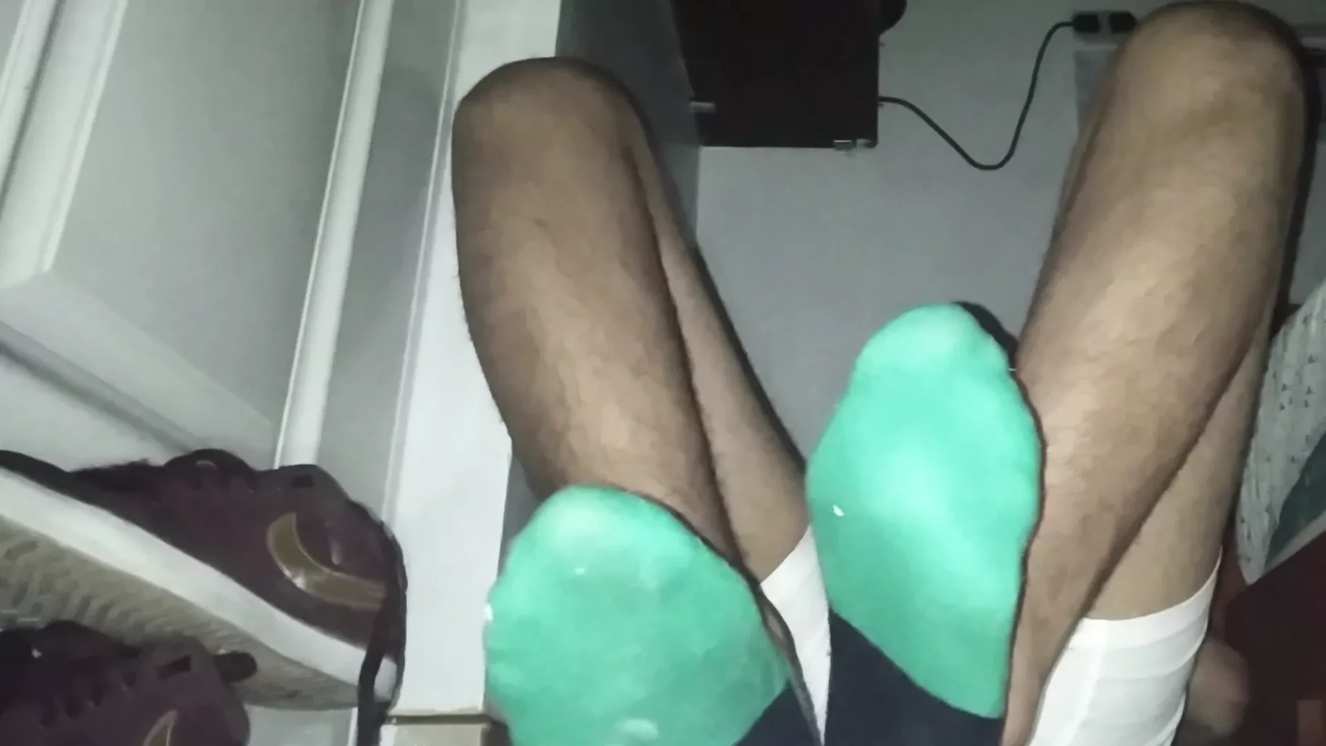 Having fun with my green socks and sweaty feet