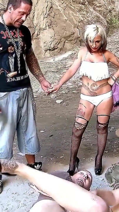 Emotional moment from "Wife Sharing Beach Sex - Inked Punk Girls Lili and Gina Rough Fucked"