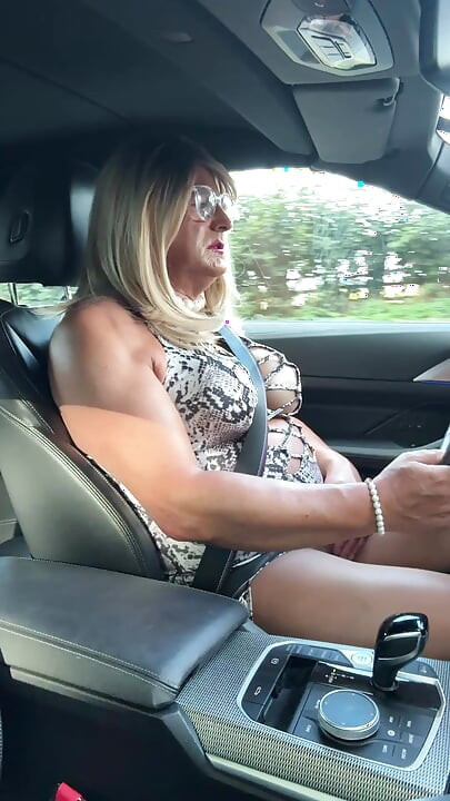 Sexy Crossdresser kellycd2022 in white animal print and pantyhose enjoying an afternoon drive