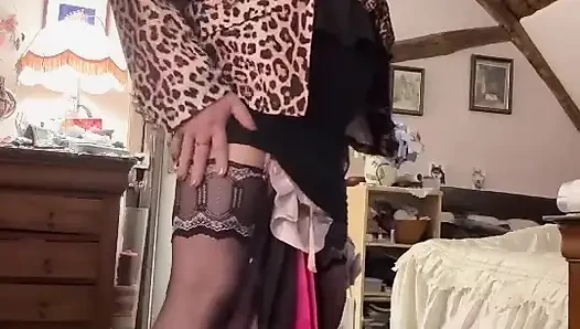 dressed in a shiny little black dress for an evening out