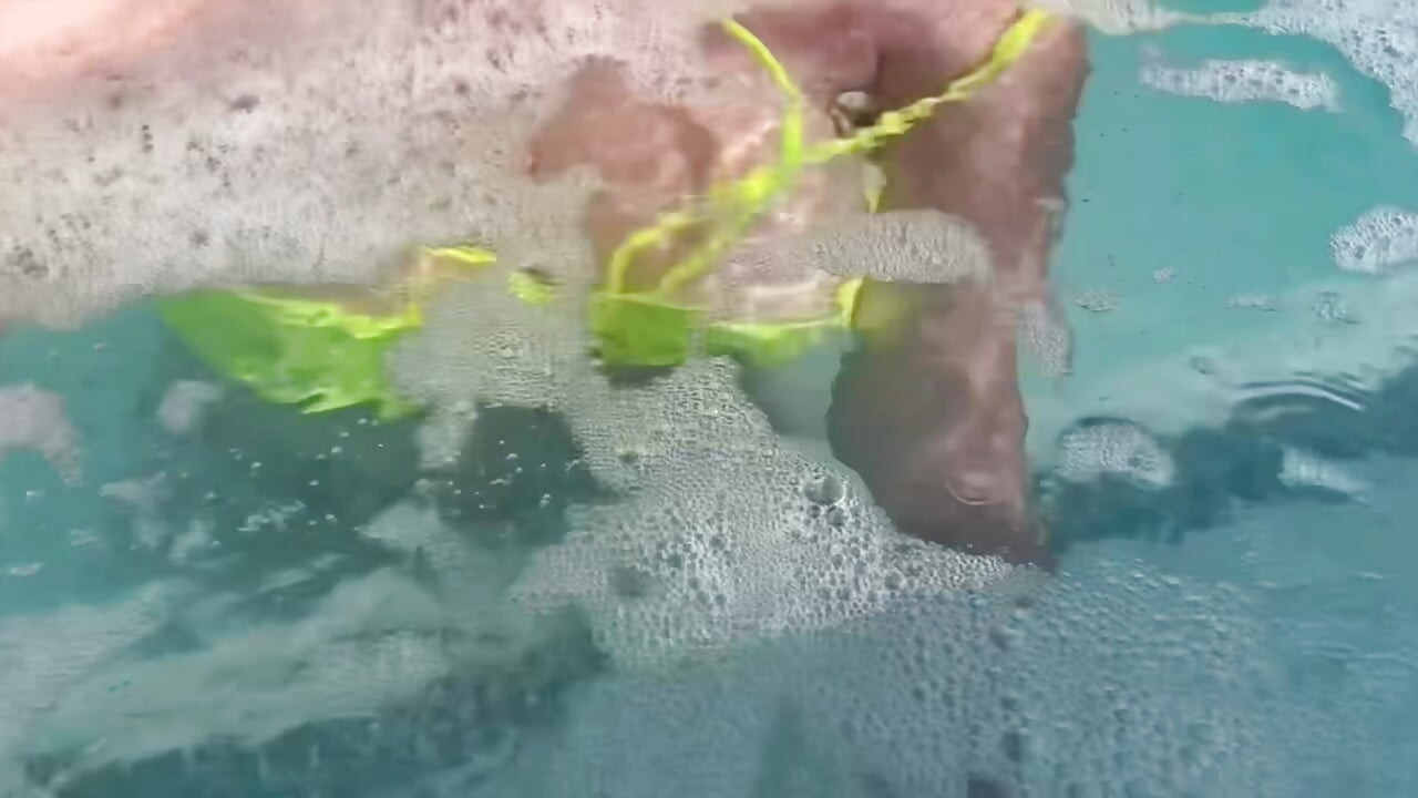Artemisia Love flashing her juicy big tits underwater for you wearing a sexy bikini