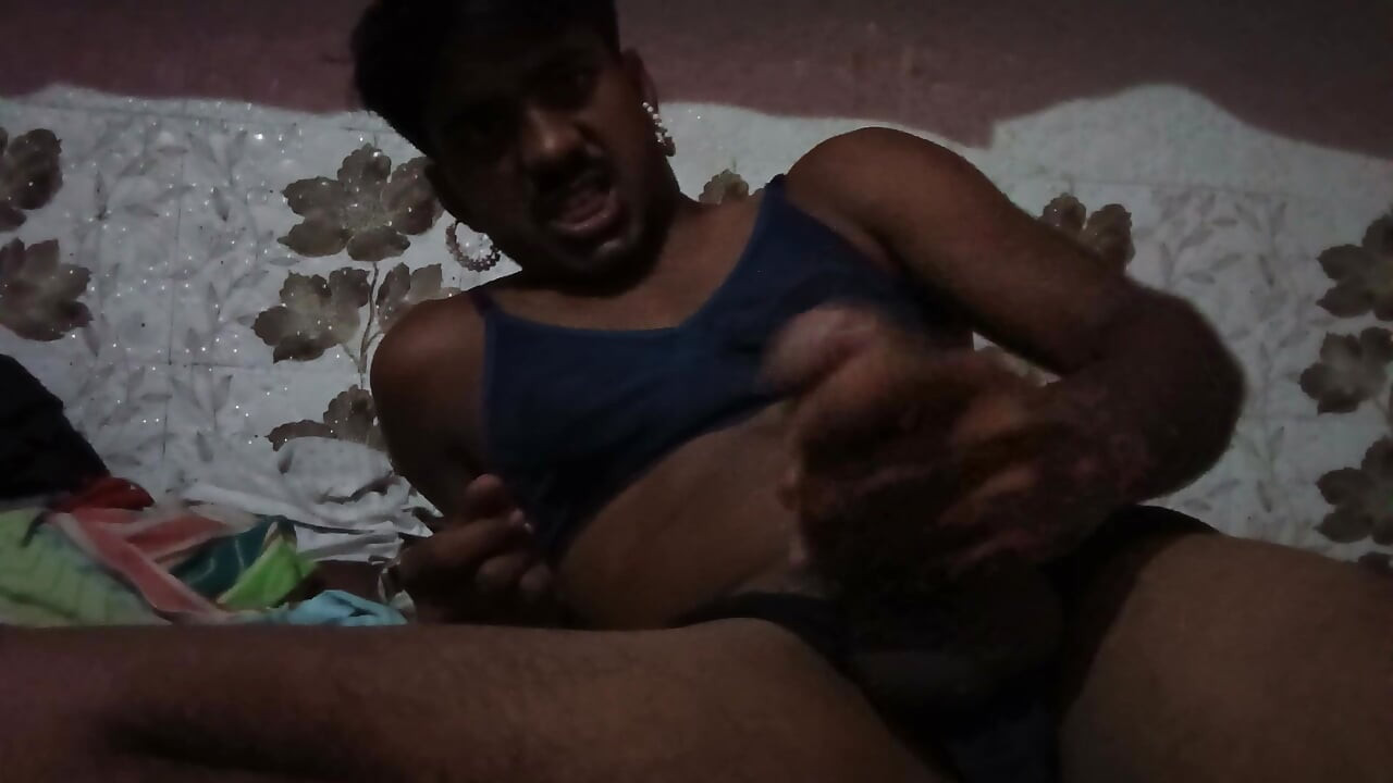The man has a small and thick penis and is massaging it
