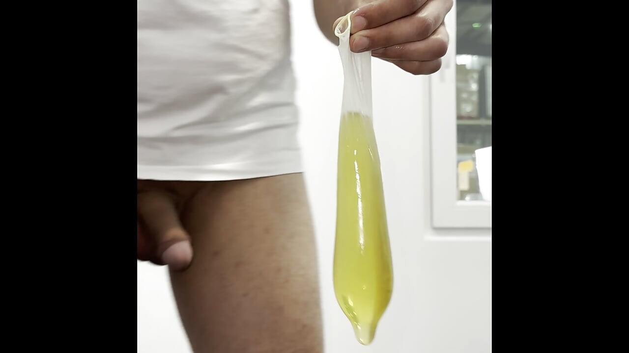 Pissing in a condom filling a condom at office compilation