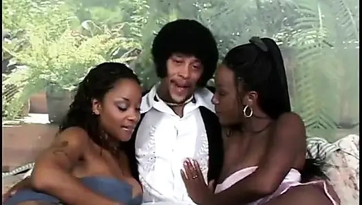 Ladies man has his dick sucked by two eager sluts in bed