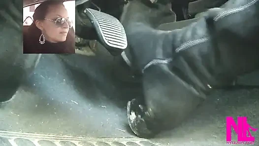 Mengemudi cepat dengan sepatu bot tinggi suede knee hitam