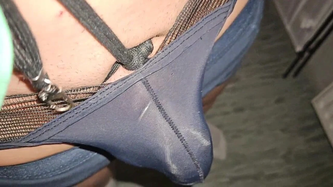 See-through thong reveals cock