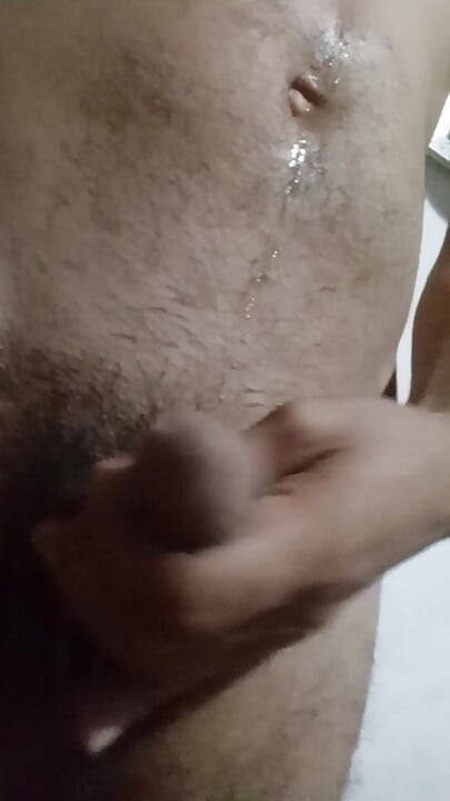Man came out of the bathroom to get a straw in his room while no one is in his house