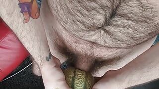 Jerking off using a cantaloupe