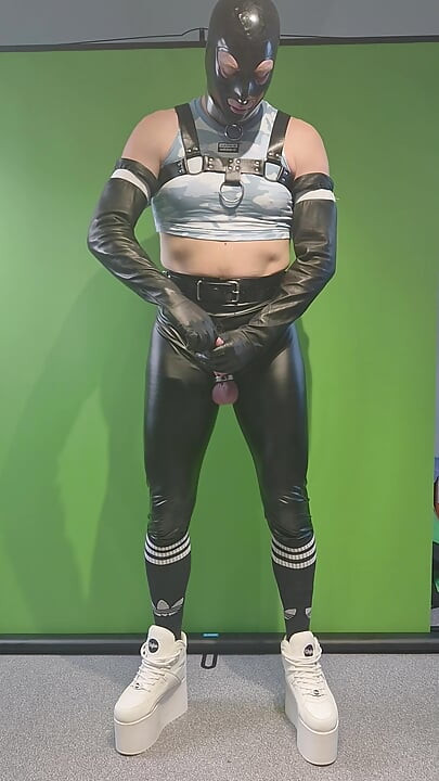 Rave outfit, Buffalo tower shoes, harness, leggings, latex gloves and mask. Inserting butt plug using precum