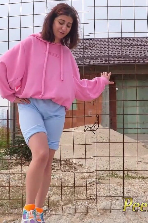 Hipster girl changes wet clothes and pee outdoor