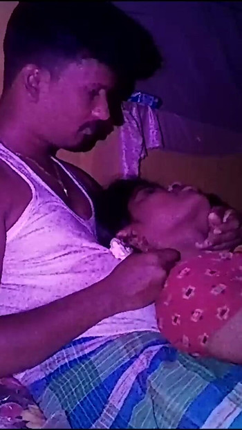 Key moment from "Indian village house wife boobs pressing and romantic movement"