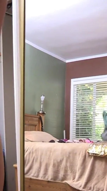 Iconic moment from "Horny lesbians finger each other's pussies naked in bed"