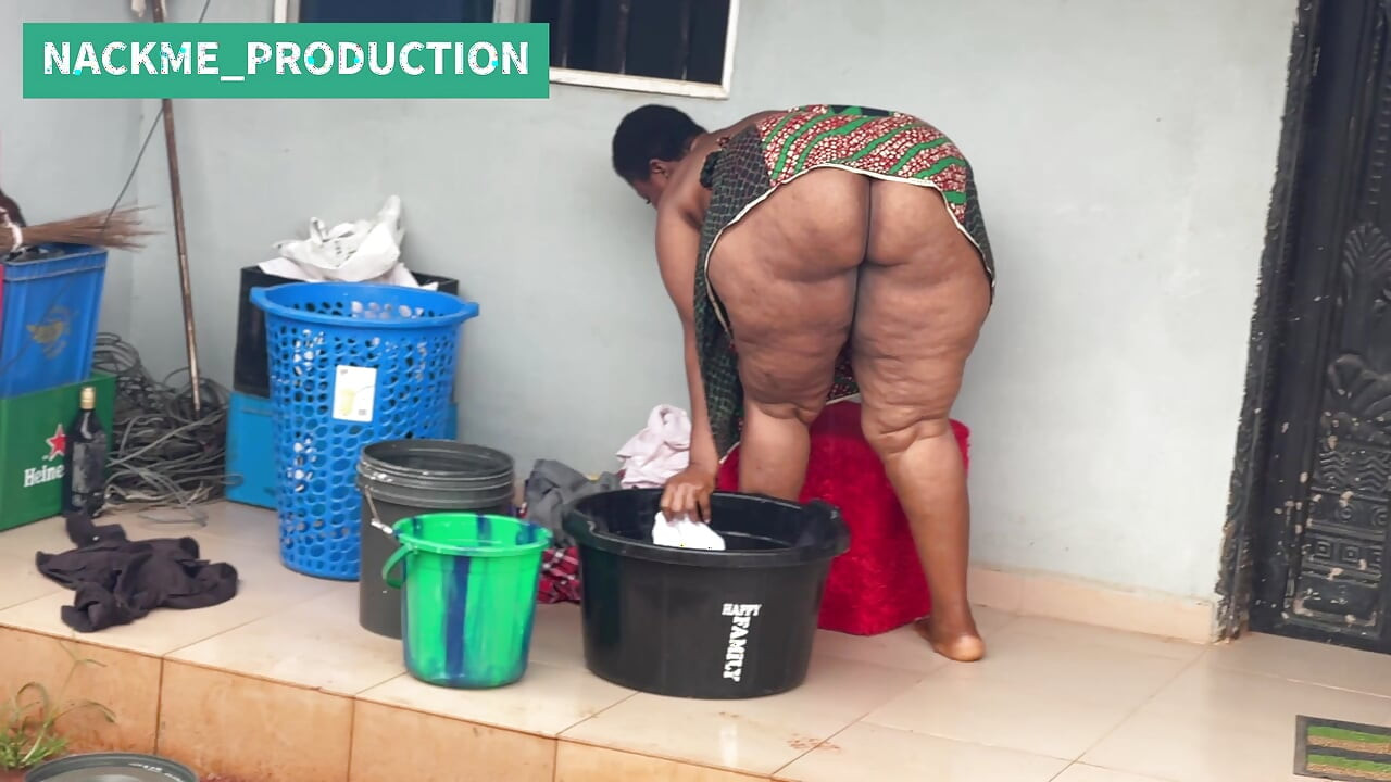 African Mama Multitasks on a Sunday Morning