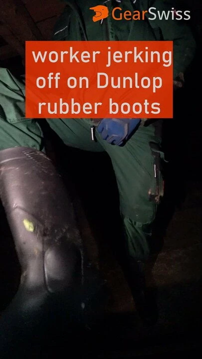 worker jerking of on Dunlop rubber boots