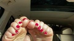 Solo mary showing feet and toes in car