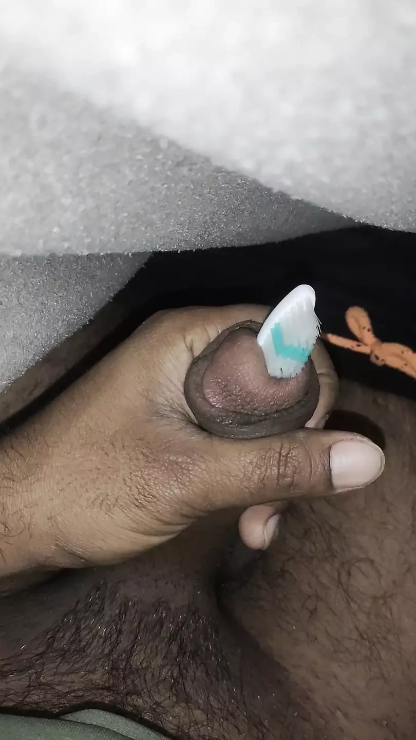 Tooth brush inserting in cock