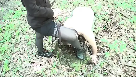 Mistress punishing her slave by putting high heels inside his mouth