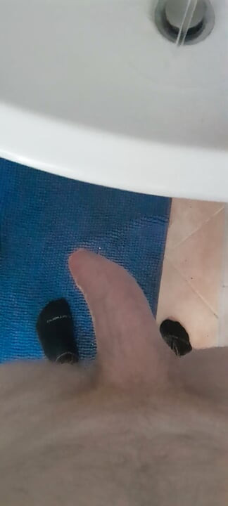 Ginger amateur cumming solo and cleaning dick in shower