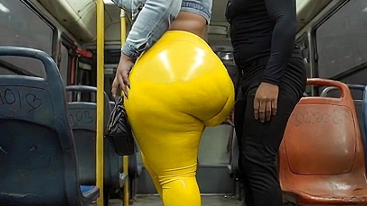 "Masked BBW Teases Huge Ass in Shiny Yellow Leggings on Public Bus"
