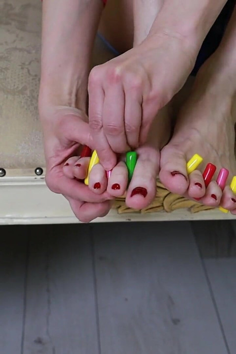 Sweet Toe Tease - Colorful Candy Between Her Toes