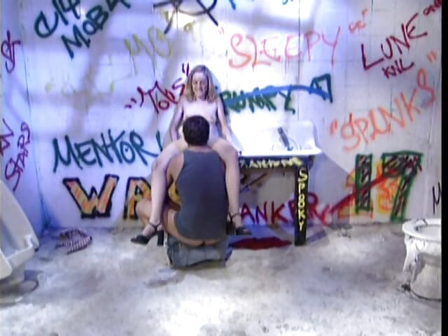 Slender Blonde Gets Fucked by a Stud in an Abandoned Toilet