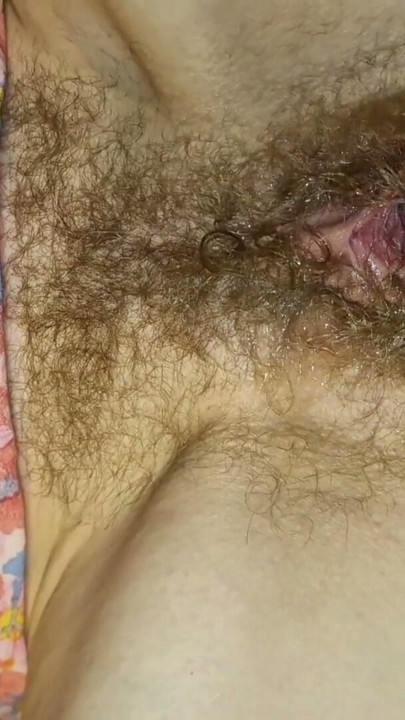 He fucks her with his whole hand while she watches porn. Her pussy is wet and stretched. | Clip 1