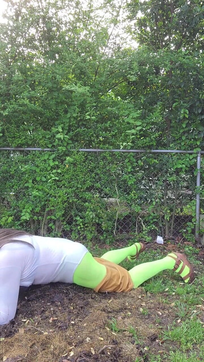 Memorable moment from "Gay crossdress tease, outdoors ground humping in pantyhose, black bra, miniskirt."