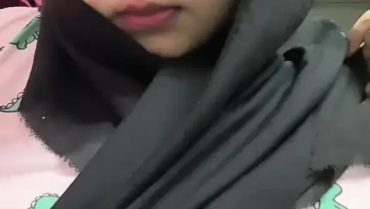 Hijabi malay sucking dildo