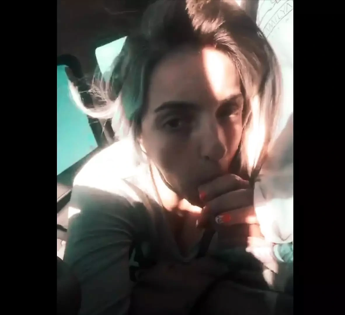 Professional cock sucker. She blows the cab driver to pay the fare.