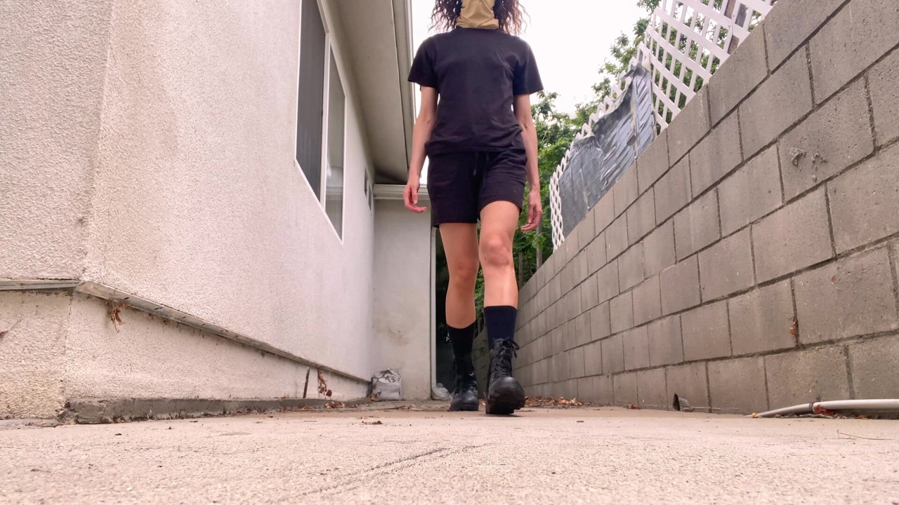 Crushing Toy Truck in Combat Boots (close-up)