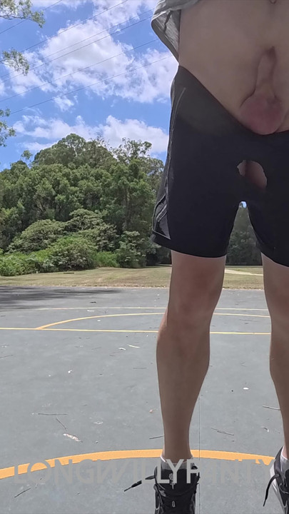 Straight guy hanging out his uncut cock at the public space.