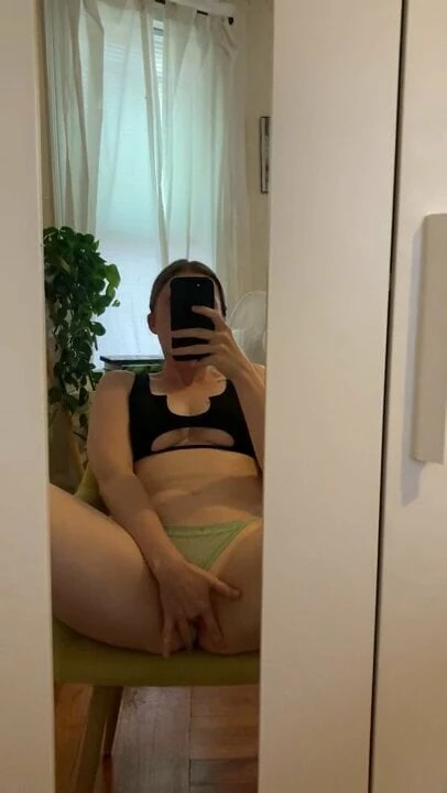 Cutie pulls panties to side and finger fucks herself