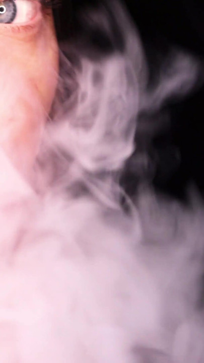 4K Applying red lipstick and smoking hookah on black background