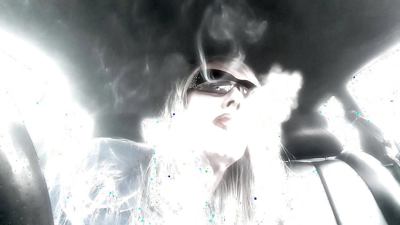 Mrs. Ruthie Dommie Mommy smoking Marlboro 100s in her car