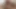 Kuzgun wylde bir footjob, oral seks ve handjob verir