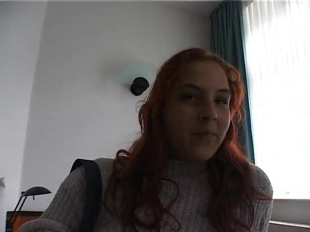 Hairy redhead bbw fingers her pussy on the bed