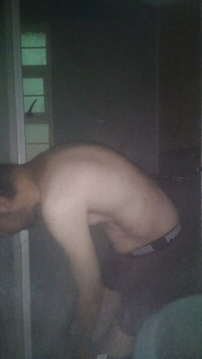 Man Showering with Flashlight On