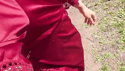 pissing outside near grape tree