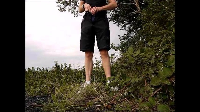 Wanking outside in bike shorts