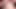 Kırmızılı seksi sarışın kanepede iki büyük yarağı emiyor ve sulu göğüslerine sıvazlıyor