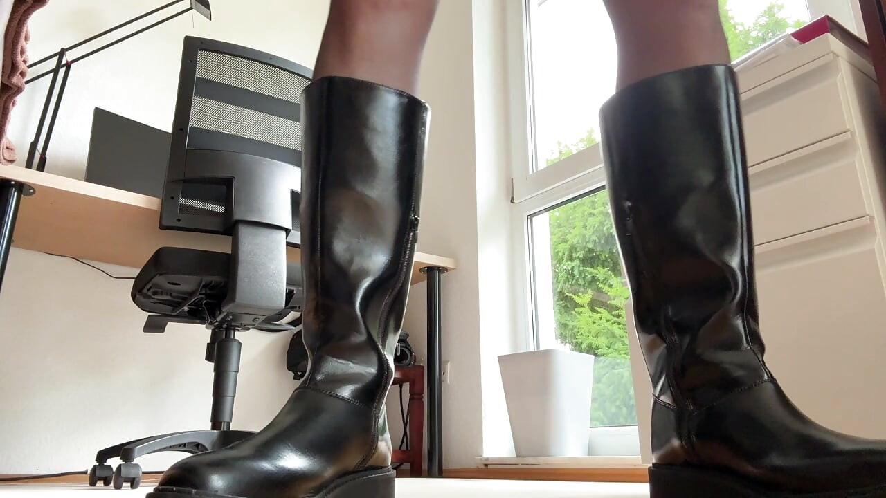 Secretary in shiny short skirt plays alone