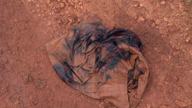 red tartan skirt getting kicked on dirt road and mud puddles