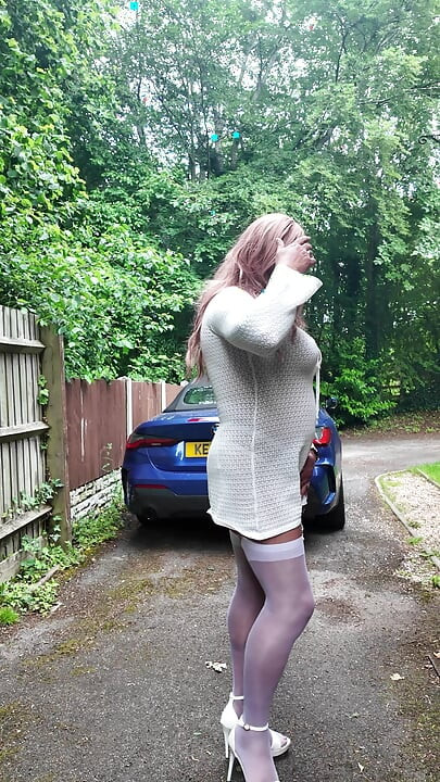 Crossdresser kellycd in white dress stockings and heels