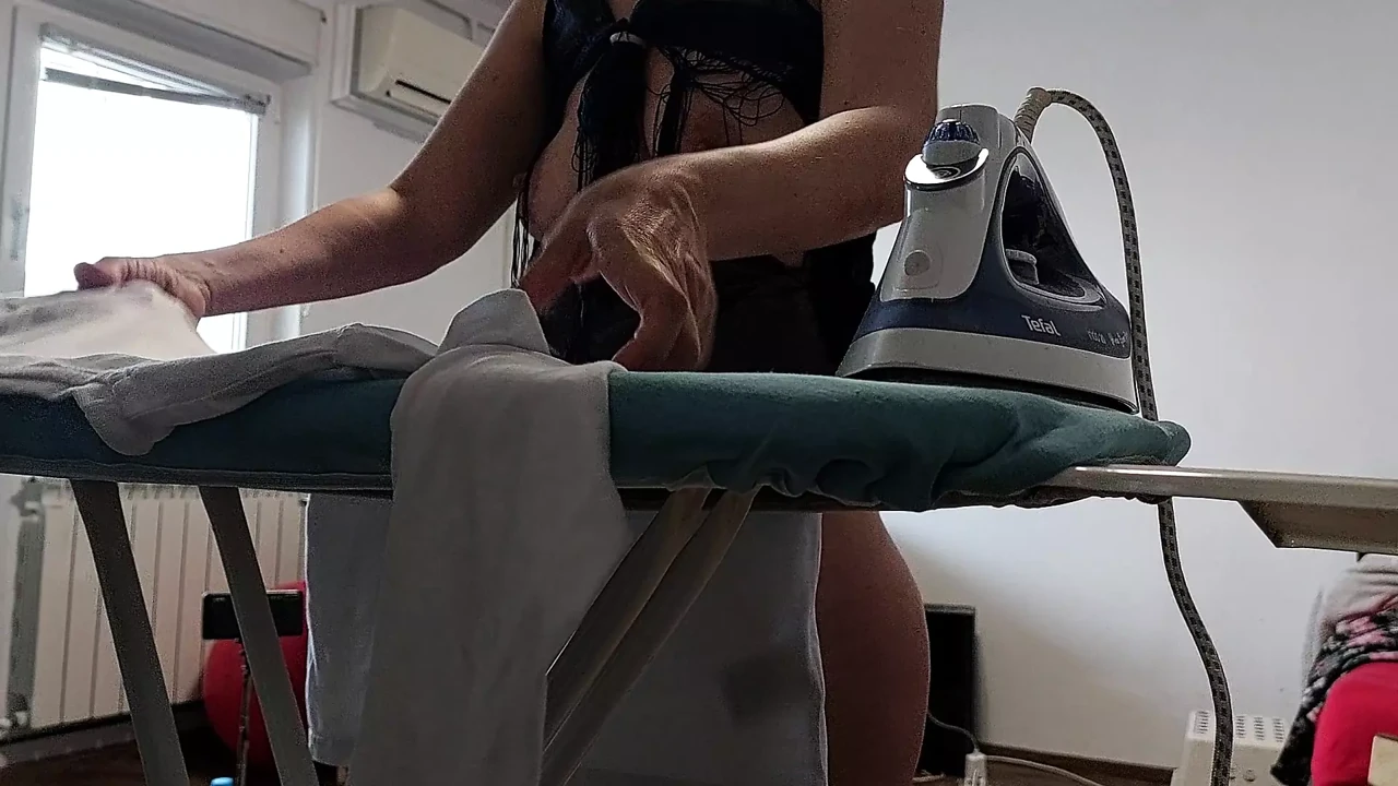 Amateur woman doing housework naked. Brunette hairy pussy, big tits, big ass.