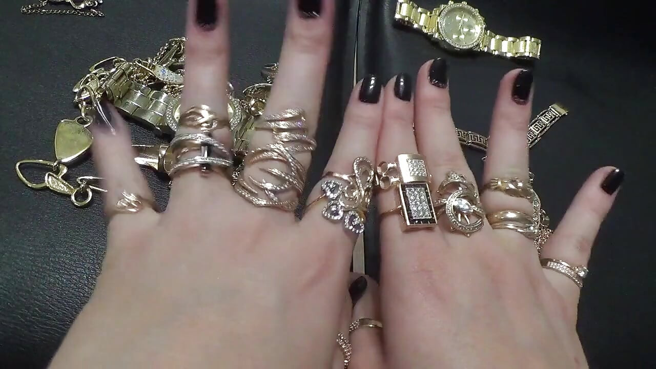 Golden jewelry and hand fetish