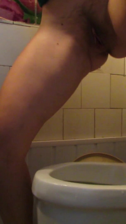 I pee in the toilet and stuff my thong into my cunt | Clip 1