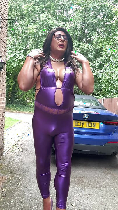 Sexy Crossdresser kellycd2022 in purple pvc catsuit and heels